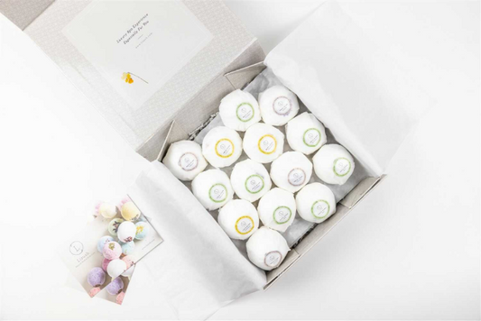 This set of Natural Bath Bombs Includes:  ❀ 14 Handmade all-natural Bath Bombs with Essential Oils  - (Lavender, Lemongrass, Mint, Eucalyptus) - Each bath bomb is 2.5'' Diameter ❀ Each Bath Bomb is individually wrapped with wax paper and a Lizush label indicating the scent ❀ Gorgeous box. Make it special and add a name on the lid ❀ Your personal note printed free on a beautiful greeting card   